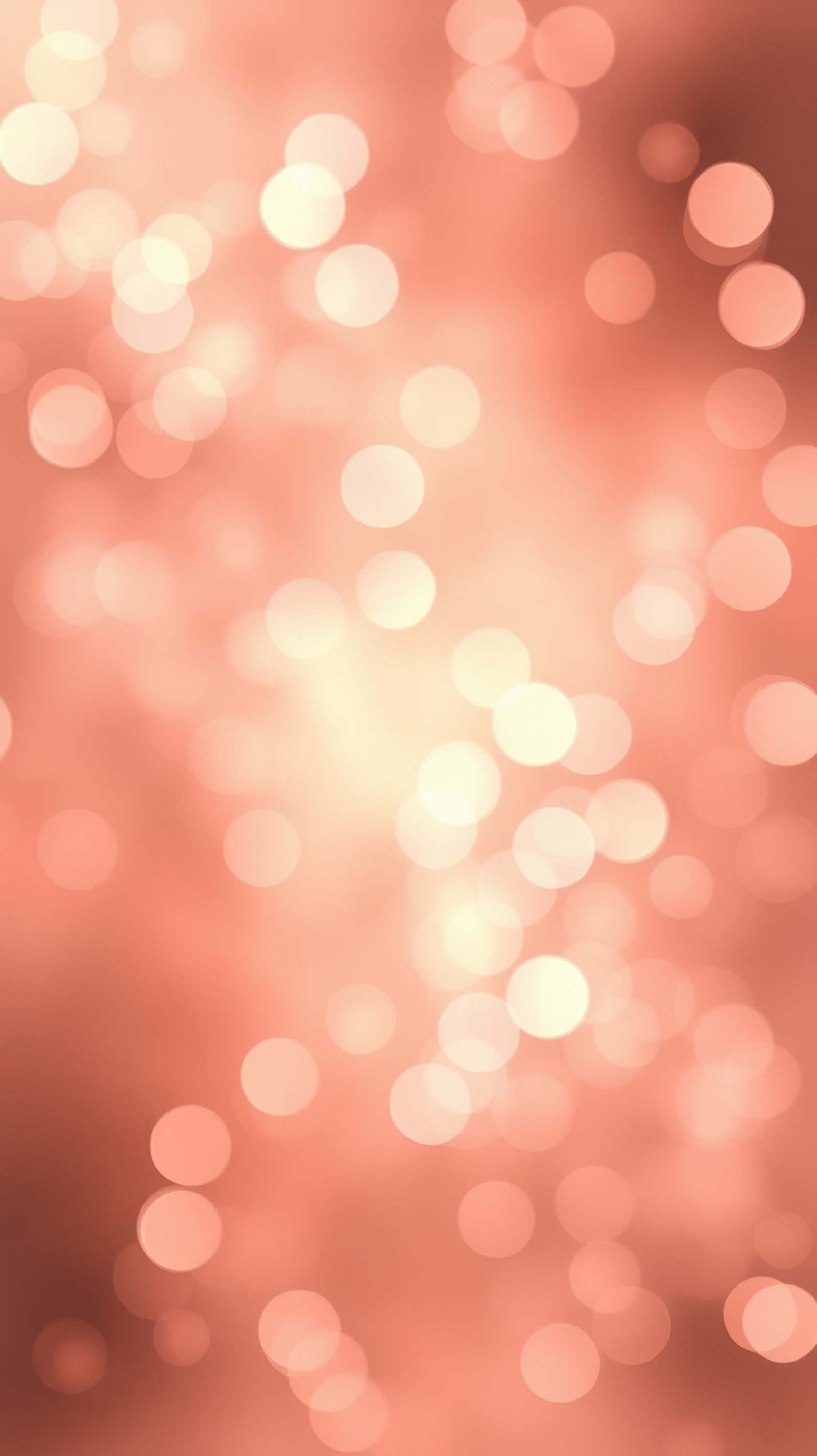 Colorful bokeh lights create a warm and inviting atmosphere during a festive celebration in a cozy indoor space